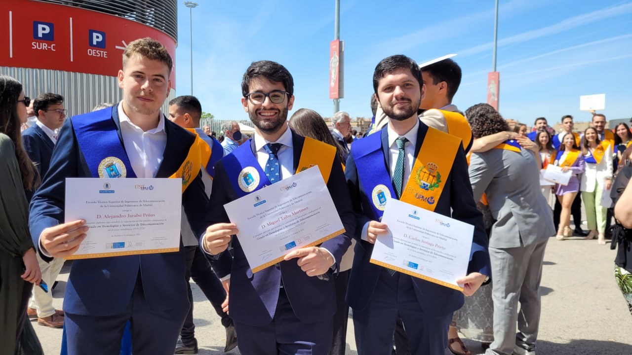 Holding the ETSIT UPM degree certificates with Miguel Taibo and Carlos Arriaga