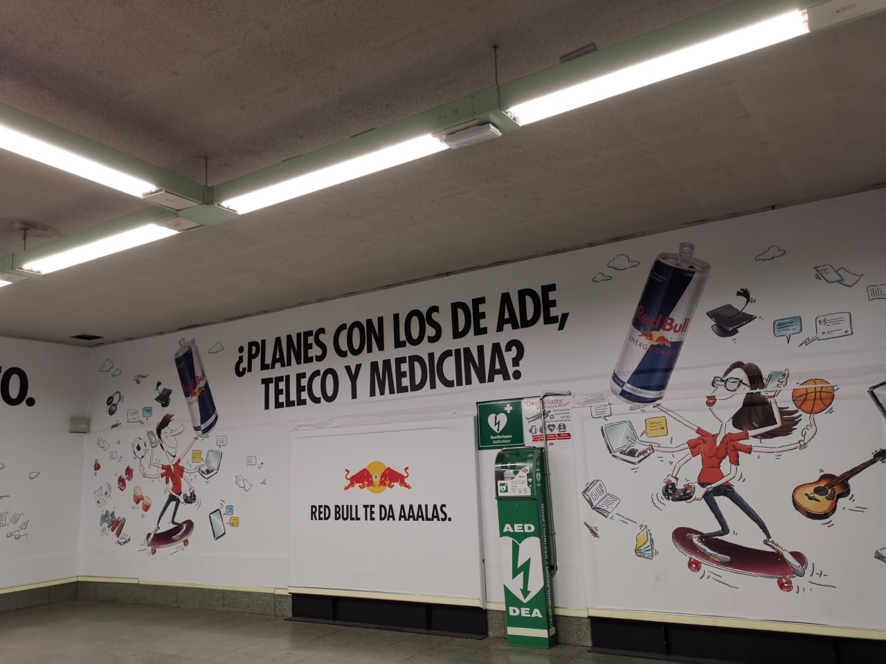 Madrid metro: the Red Bull ad asking about plans with ADE, Teleco and Medicina students