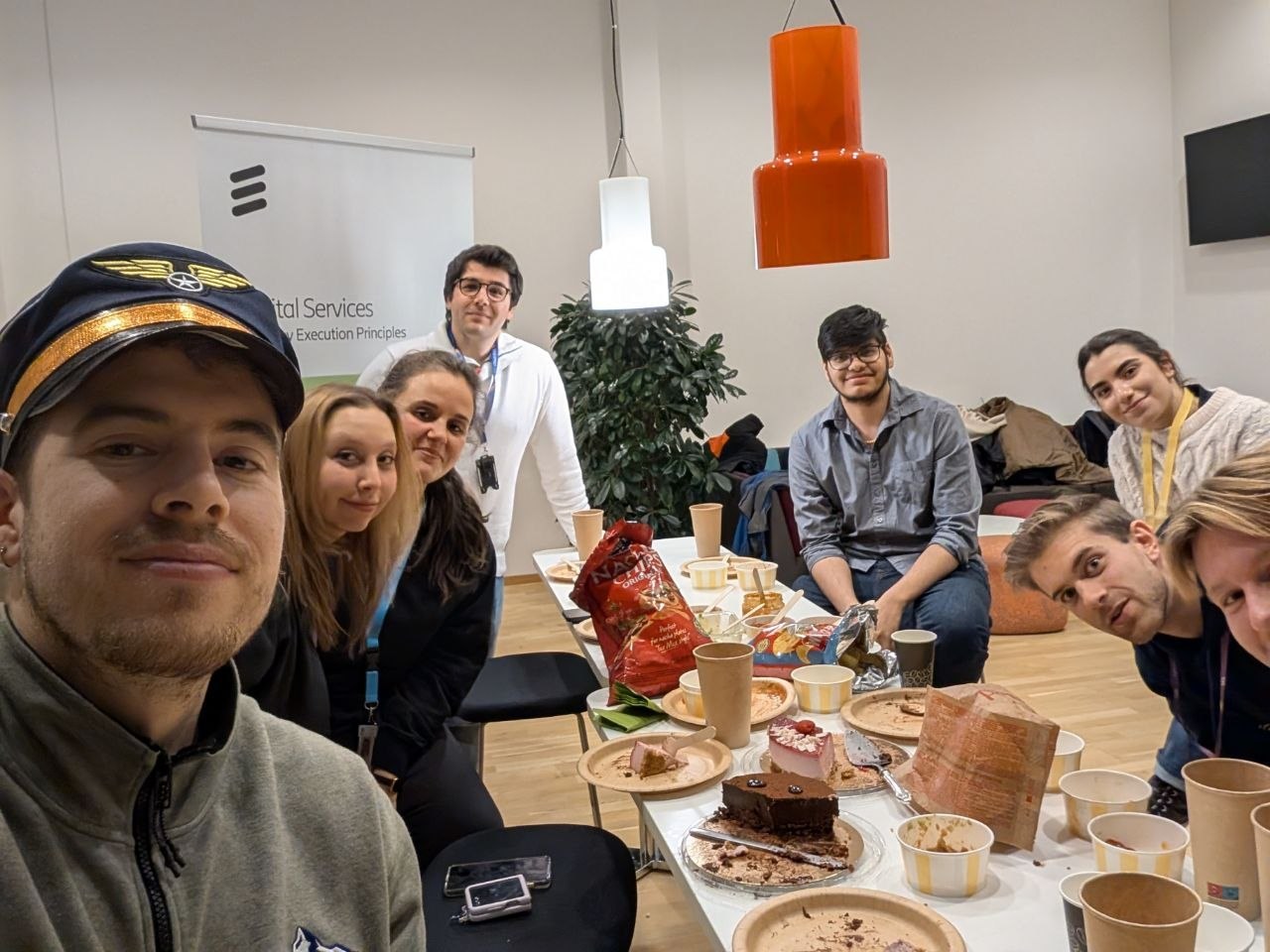 Farewell celebration around the office table